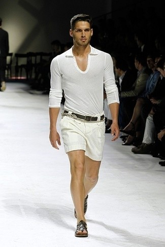 Tobacco Leather Sandals Outfits For Men: Combining a white polo with beige shorts is an on-point choice for a laid-back but dapper look. For something more on the daring side to complement this outfit, introduce a pair of tobacco leather sandals to the equation.