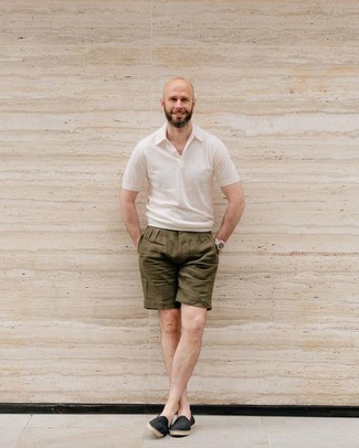 White Polo Outfits For Men: Wear a white polo and olive shorts for a casual getup with a twist. Black canvas espadrilles look amazing here.