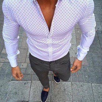White and Navy Print Dress Shirt Outfits For Men: Teaming a white and navy print dress shirt and charcoal chinos is a fail-safe way to breathe polish into your styling lineup. For something more on the dressier end to complete your look, add navy leather tassel loafers to your look.