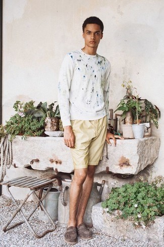 Beige Shorts Outfits For Men: Go for a white print sweatshirt and beige shorts if you want to look casually dapper without exerting much effort. Why not add a pair of brown suede loafers to the mix for a dose of refinement?