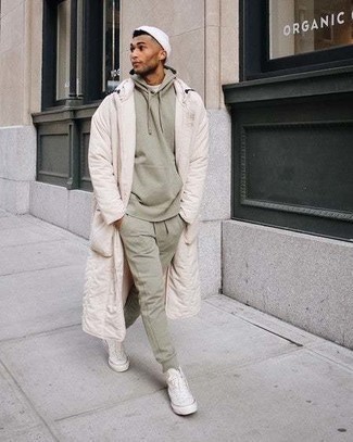 White Beanie Outfits For Men: This combination of a white raincoat and a white beanie offers comfort and efficiency and helps keep it low-key yet modern. Add a pair of white canvas high top sneakers to your ensemble for a sense of refinement.