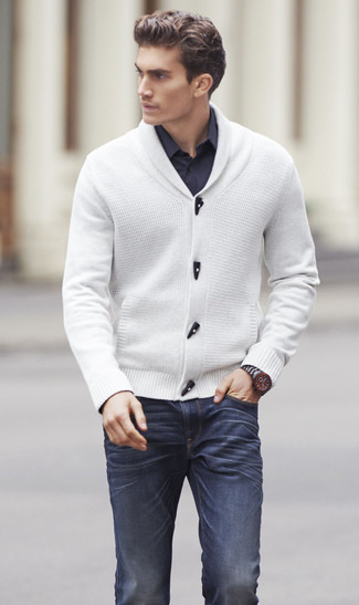 White Cardigan Outfits For Men: This off-duty combo of a white cardigan and navy jeans is a safe option when you need to look neat and relaxed in a flash.