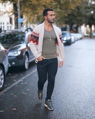 Dark Green Athletic Shoes Outfits For Men: This pairing of a white print shawl cardigan and navy jeans is irrefutable proof that a simple casual look can still look really dapper. If you need to instantly dress down your outfit with footwear, why not add a pair of dark green athletic shoes to this ensemble?
