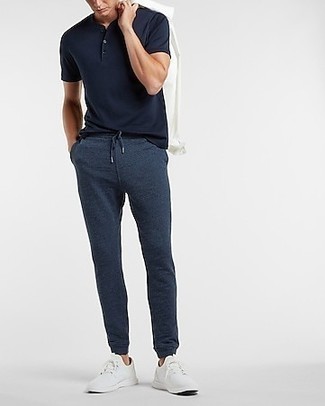 Navy Sweatpants Warm Weather Outfits For Men: This combo of a white shirt jacket and navy sweatpants looks awesome and makes any man look instantly cooler. To infuse an element of stylish casualness into this ensemble, complete your outfit with white athletic shoes.