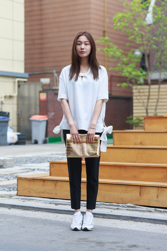 Women's White Short Sleeve Blouse, Black Dress Pants, White Athletic Shoes, Gold Leather Clutch