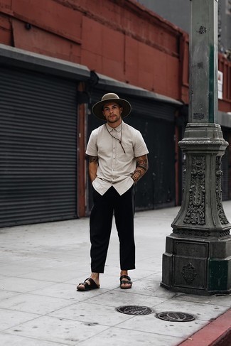 Black Leather Sandals Outfits For Men: If you want take your casual game up a notch, go for a white short sleeve shirt and black chinos. Infuse an easy-going feel into your ensemble with a pair of black leather sandals.