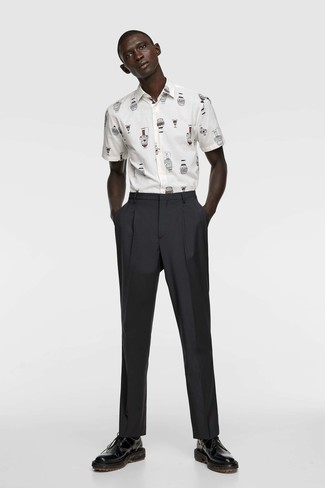 White and Black Print Short Sleeve Shirt Outfits For Men: A white and black print short sleeve shirt and black dress pants are an easy way to infuse some polish into your daily styling arsenal. Spice up your getup with a dressier kind of shoes, such as these black leather derby shoes.
