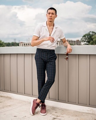 Red Leather Low Top Sneakers Outfits For Men: This laid-back combination of a white linen short sleeve shirt and navy plaid chinos couldn't possibly come across other than ridiculously stylish. Complete this getup with red leather low top sneakers and you're all done and looking boss.
