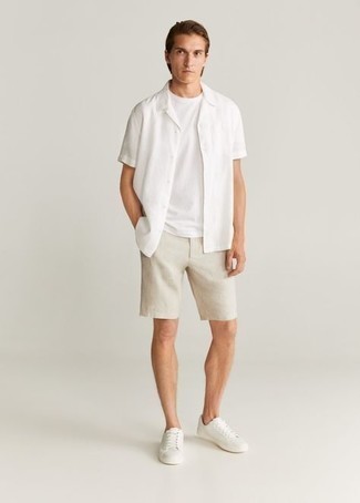 Beige Shorts Outfits For Men: Why not consider teaming a white short sleeve shirt with beige shorts? Both of these items are very functional and look good worn together. If you're puzzled as to how to finish, a pair of white canvas low top sneakers is a fail-safe option.