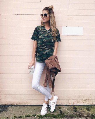 Women's White Leather Low Top Sneakers, White Skinny Jeans, Dark Green Camouflage V-neck T-shirt, Brown Suede Biker Jacket