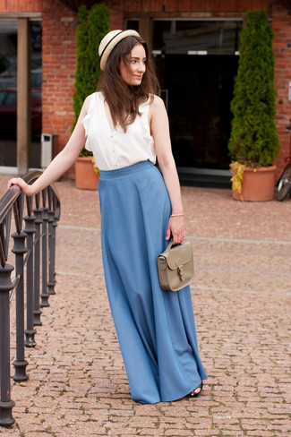 Blue Maxi Skirt Outfits: Pair a white sleeveless top with a blue maxi skirt for a daily ensemble that's full of charisma and personality.