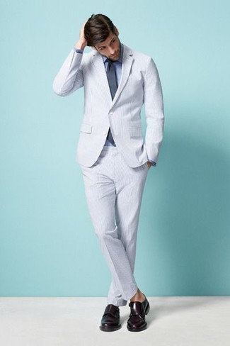 White Seersucker Suit Outfits: Opt for a white seersucker suit and a blue dress shirt if you're aiming for a proper, stylish outfit. You can get a bit experimental on the shoe front and complement your ensemble with a pair of burgundy leather double monks.