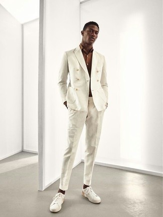 White Suit Outfits: A white suit looks especially classy when worn with a brown short sleeve shirt for an ensemble worthy of a modern gent. A great pair of white canvas low top sneakers is an effortless way to give an element of stylish nonchalance to this getup.