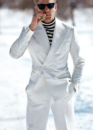 White Suit Outfits: Teaming a white suit with a white and black horizontal striped turtleneck is an on-point idea for a smart and classy outfit.