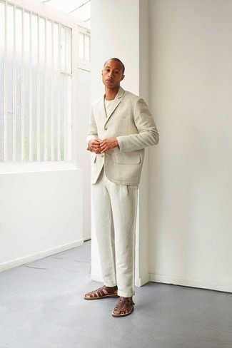 Brown Leather Sandals Outfits For Men: Putting together a white suit and a white crew-neck t-shirt is a fail-safe way to infuse your current collection with some casual sophistication. Brown leather sandals are a fail-safe way to bring a sense of stylish effortlessness to this outfit.
