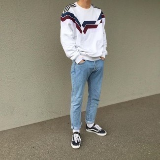 White Print Sweatshirt Outfits For Men: For comfort dressing with a twist, you can rock a white print sweatshirt and light blue jeans. Black and white canvas low top sneakers are a welcome addition to your ensemble.