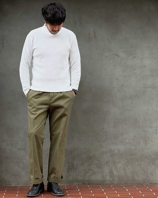 White Turtleneck Smart Casual Outfits For Men: If you're looking to take your casual style game up a notch, consider teaming a white turtleneck with olive chinos. Let your outfit coordination savvy really shine by complementing your ensemble with a pair of black leather casual boots.