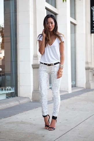 Women's White V-neck T-shirt, White Snake Skinny Jeans, Black Leather Heeled Sandals, Black Leather Belt