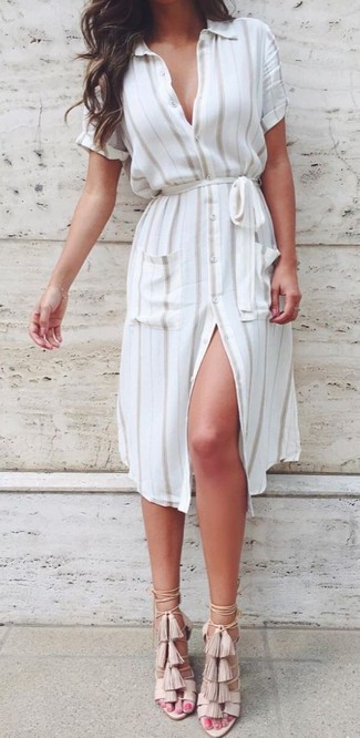 White Vertical Striped Shirtdress Outfits: Reach for a white vertical striped shirtdress to feel confident and look trendy. Amp up this getup by slipping into a pair of beige fringe leather heeled sandals.