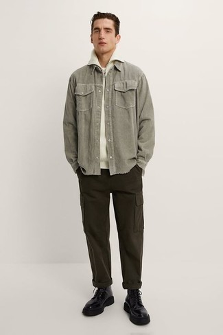 Olive Corduroy Long Sleeve Shirt Outfits For Men: Such pieces as an olive corduroy long sleeve shirt and dark brown cargo pants are the ideal way to infuse effortless cool into your off-duty fashion mix. Bump up the wow factor of your look by wearing black leather work boots.