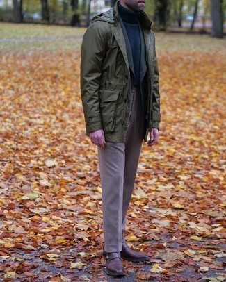 Olive Windbreaker Outfits For Men: Dress in an olive windbreaker and brown dress pants for incredibly stylish attire. If you need to immediately smarten up your ensemble with shoes, why not add a pair of dark brown leather double monks to the equation?