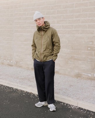 Grey Beanie Outfits For Men: Choose an olive windbreaker and a grey beanie for an unexpectedly cool menswear style. The whole look comes together when you complete your look with grey athletic shoes.