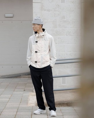 White Windbreaker Outfits For Men: This combo of a white windbreaker and black chinos is impeccably stylish and yet it looks easy and ready for anything. Want to break out of the mold? Then why not add a pair of white athletic shoes to the equation?