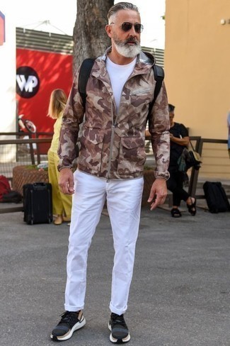 Brown Camouflage Windbreaker Outfits For Men: One of the most popular ways for a man to style a brown camouflage windbreaker is to wear it with white chinos for an off-duty getup. Put a different spin on an otherwise standard outfit by slipping into a pair of dark green athletic shoes.