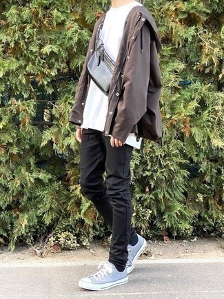 Dark Brown Windbreaker Outfits For Men: A dark brown windbreaker and black chinos? This is easily a wearable look that anyone could wear on a day-to-day basis. Let your styling prowess really shine by finishing your look with light blue canvas low top sneakers.