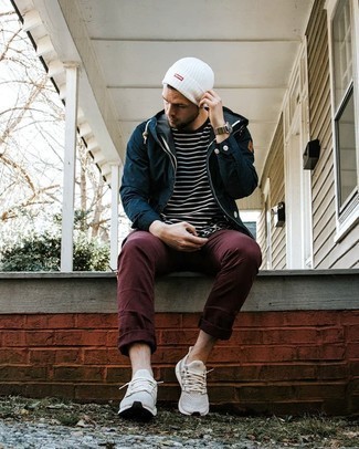 Black Horizontal Striped Crew-neck T-shirt Outfits For Men: Wear a black horizontal striped crew-neck t-shirt and burgundy chinos for both seriously stylish and easy-to-create outfit. A pair of grey athletic shoes effortlessly steps up the street cred of this look.