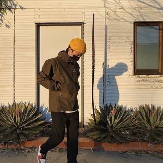 Mustard Beanie Outfits For Men: A dark brown windbreaker and a mustard beanie paired together are a sartorial dream for those who prefer casual outfits. White and red leather low top sneakers will inject a dose of refinement into an otherwise simple outfit.