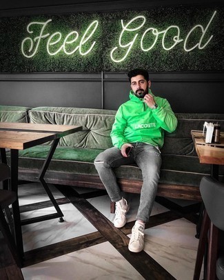 Men's Green Windbreaker, White Crew-neck T-shirt, Grey Ripped Jeans, White and Black Canvas Low Top Sneakers