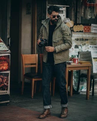 Olive Windbreaker Outfits For Men: Try teaming an olive windbreaker with black jeans for an off-duty outfit with a modern finish. You can take a classic approach with shoes and complete your ensemble with dark brown leather casual boots.