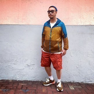 Tobacco Windbreaker Outfits For Men: If you're in search of an off-duty and at the same time on-trend outfit, dress in a tobacco windbreaker and orange sports shorts. Our favorite of a ton of ways to round off this ensemble is brown athletic shoes.