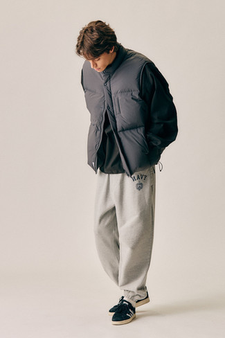 Men's Black Windbreaker, Charcoal Quilted Gilet, Grey Sweatpants, Black and White Suede Low Top Sneakers
