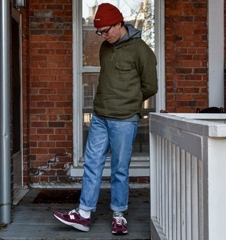 Red and White Athletic Shoes Outfits For Men: For relaxed dressing with a street style twist, consider wearing an olive windbreaker and blue ripped jeans. Inject a more laid-back vibe into your outfit with a pair of red and white athletic shoes.