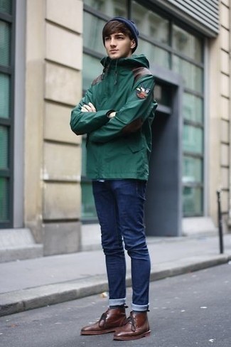 Olive Windbreaker Outfits For Men: This pairing of an olive windbreaker and navy jeans is the ultimate laid-back style for any gentleman. Get a little creative when it comes to footwear and polish off this look by finishing with brown leather desert boots.