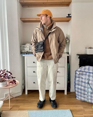 Tan Fleece Mock-Neck Sweater Outfits: Teaming a tan fleece mock-neck sweater with white chinos is a nice choice for a casually neat ensemble. Finishing with a pair of black athletic shoes is a surefire way to bring a more relaxed spin to your look.
