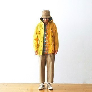 Men's Mustard Windbreaker, Multi colored Plaid Short Sleeve Shirt, Khaki Chinos, Brown Canvas Low Top Sneakers