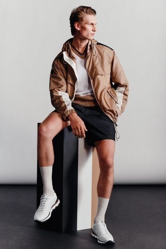 White and Brown Athletic Shoes Outfits For Men: Definitive proof that a tan windbreaker and black shorts look amazing when you pair them together in a casual outfit. For a more relaxed take, complete your getup with white and brown athletic shoes.