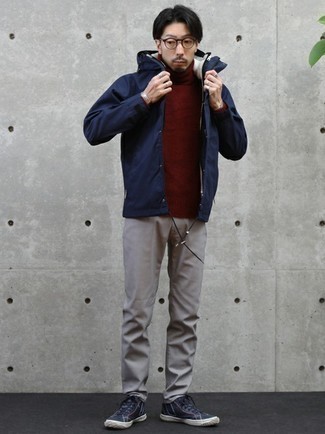 Navy Canvas High Top Sneakers Outfits For Men: A navy windbreaker and grey chinos are the perfect base for an endless number of stylish ensembles. Bump up the style factor of your ensemble by sporting navy canvas high top sneakers.