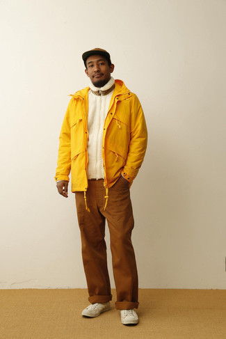 Men's Mustard Windbreaker, White Zip Sweater, Brown Chinos, White Canvas Low Top Sneakers