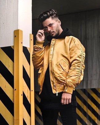Yellow Bomber Jacket Outfits For Men: Why not pair a yellow bomber jacket with black skinny jeans? These two pieces are super practical and will look great when teamed together.