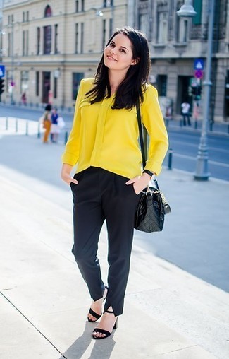 Gold Button Down Blouse Outfits: Pair a gold button down blouse with black dress pants if you're aiming for a sleek, fashionable ensemble. Let your sartorial chops truly shine by finishing this ensemble with a pair of black suede heeled sandals.