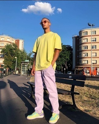 Violet Chinos Outfits: A yellow crew-neck t-shirt and violet chinos are an easy way to inject effortless cool into your daily lineup. Finishing off with a pair of yellow athletic shoes is a guaranteed way to infuse a more casual feel into this look.