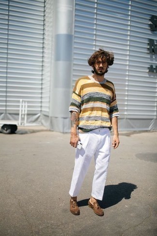 Yellow Crew-neck T-shirt Outfits For Men: For something more on the cool and laid-back side, try this pairing of a yellow crew-neck t-shirt and white chinos. Complete your ensemble with a pair of brown leather tassel loafers for a masculine aesthetic.