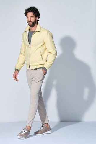 Yellow Harrington Jacket Outfits: If you're facing a sartorial situation where comfort is everything, team a yellow harrington jacket with grey chinos. Complement this ensemble with a pair of brown athletic shoes to infuse a dose of stylish effortlessness into your look.