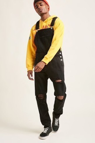 Mustard Hoodie Outfits For Men: A mustard hoodie and black denim overalls are a wonderful look to have in your casual lineup. Add a pair of black and white canvas low top sneakers to the equation to effortlessly step up the fashion factor of any ensemble.