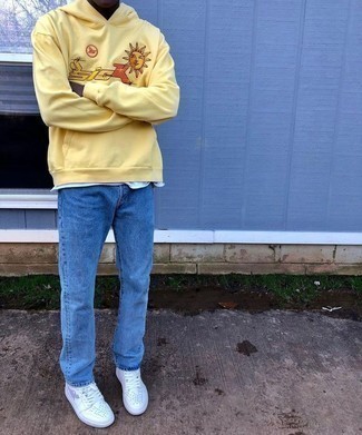Mustard Hoodie Outfits For Men: Why not team a mustard hoodie with blue jeans? Both of these pieces are totally functional and will look nice when paired together. Introduce a pair of white leather low top sneakers to the mix and ta-da: the getup is complete.