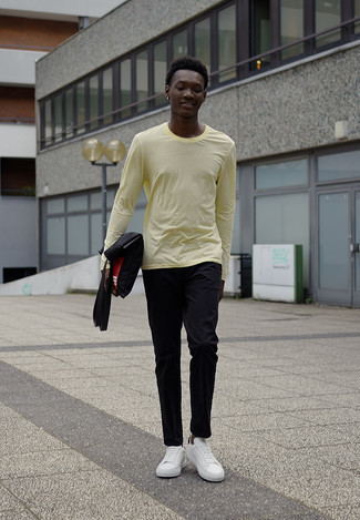 Yellow Long Sleeve T-Shirt Outfits For Men: A yellow long sleeve t-shirt and black chinos are a savvy combo to add to your current lineup. If you're puzzled as to how to round off, a pair of white and black leather low top sneakers is a foolproof option.